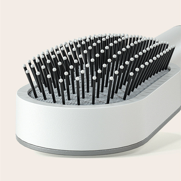 Women's Self-Cleaning Hair Brush for Hair Loss Prevention with Scalp Massage and Anti-Static Bristles